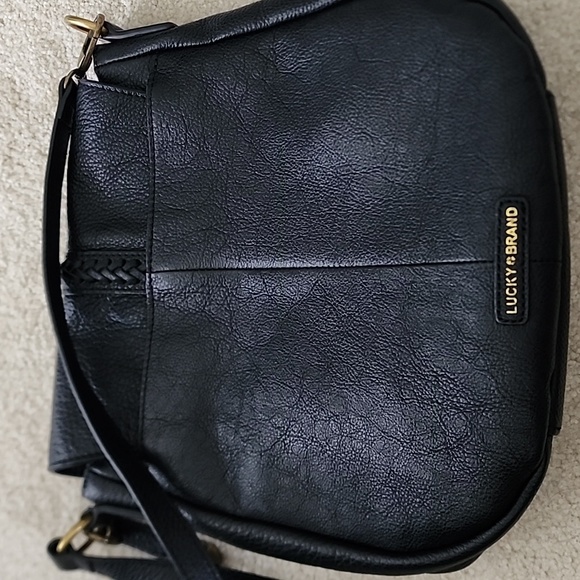 Lucky Brand black leather purse with magnetic tassle closure. It is 10"x10". - Picture 6 of 7